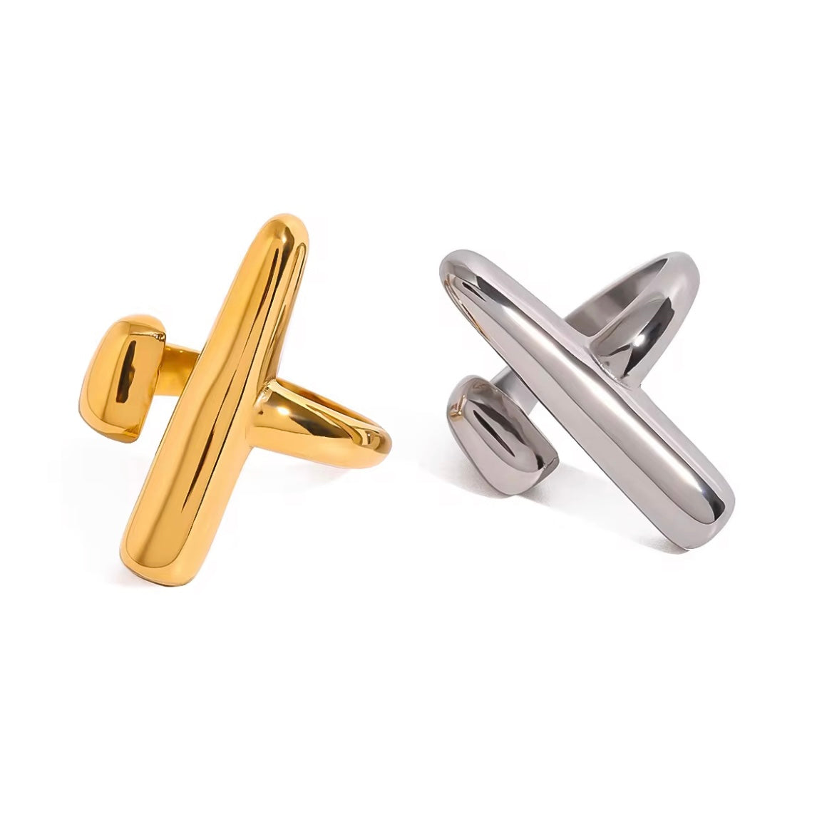 Close-up of hand wearing the Davina adjustable sculptural rings in 18K gold and silver from ELSSIZ, styled on white textured background