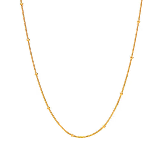 This delicate necklace is perfect for adding a touch of girly charm to any outfit. The thin bead chain adds a dainty and feminine look, making it an ideal accessory for any fashion-forward individual. A must-have for any jewelry collection!

Made to last! 

Tarnish and Water Resistant, Hypoallergenic

16.5 inches long- 2" Extension 

 

Closure :Lobster Clasp

18k Gold Plated over 316L Stainless Steel base.  

 

 