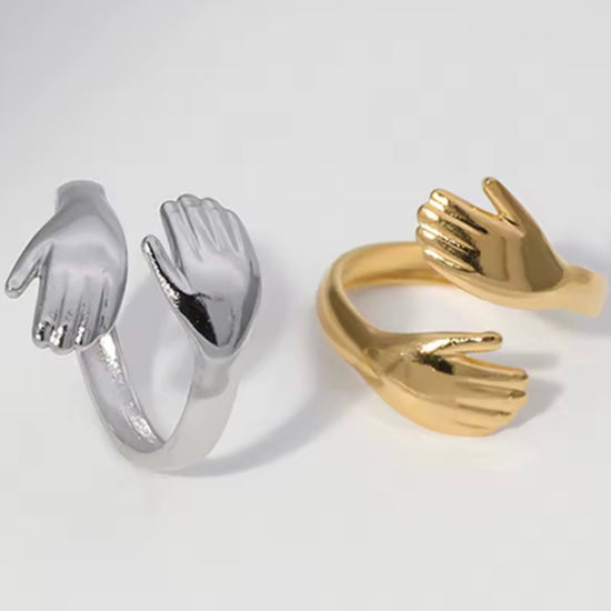 The Hands on Open Ring offers a minimalistic and cute design, perfect for those with a girly style. Its open design makes it easy to adjust for the perfect fit. Bring a touch of elegance to any outfit with this versatile and stylish accessory.

Fits SIZE - 7/8 Adjustable

Stainless Steel 18K Gold PVD Plated - Made to last!

Hypoallergenic, Tarnish free 