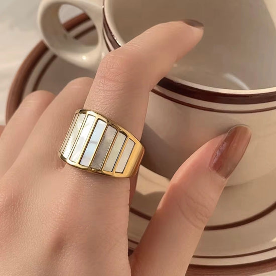 Upgrade your look with the Kelly Mother of Pearl Ring. This elegant piece features durable, non-tarnish materials, making it perfect for beach outings or any occasion. Its unique design is sure to spark conversation.

Stainless Steel 18K Gold Plated - Made to last!

Non Tarnish, Water Resistant , Hypoallergenic, Friendly 

 