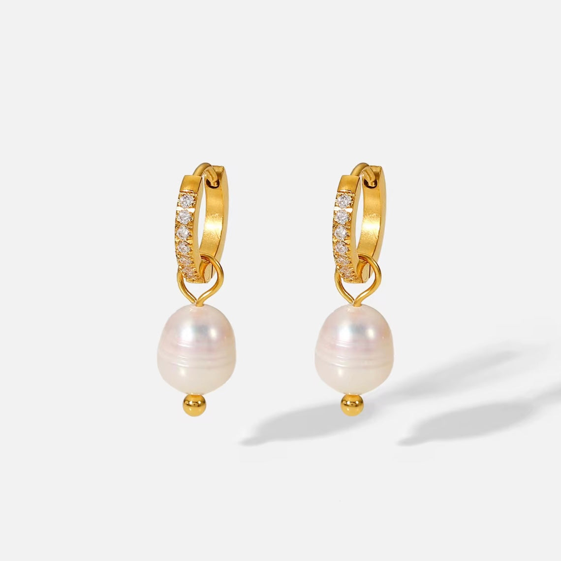 Hope you love or Allegra earring as much as we do. 
These classy babies will complete any outfit!

Made to last! 

Tarnish and Water Resistant. & Hypoallergenic

Latch hoop .5 inch x .5 inch 

18k Gold Plated over Stainless Steel  base.  

Fresh Water Pearl 

 

 .

 

 
