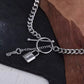Add a touch of edge to your look with our Lock & Key Chain Necklace. The thick cuban link design is both bold and stylish, while the unique lock and key feature adds a touch of romance. A must-have statement piece for any fashionista.

Made to last! 

Tarnish and Water Resistant, Hypoallergenic

 

18 inches long 

 

18k Gold PVD Plated over 316L Stainless Steel base.  

 

 