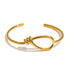 Gold knot cuff bracelet stainless steel non tarnish jewelry