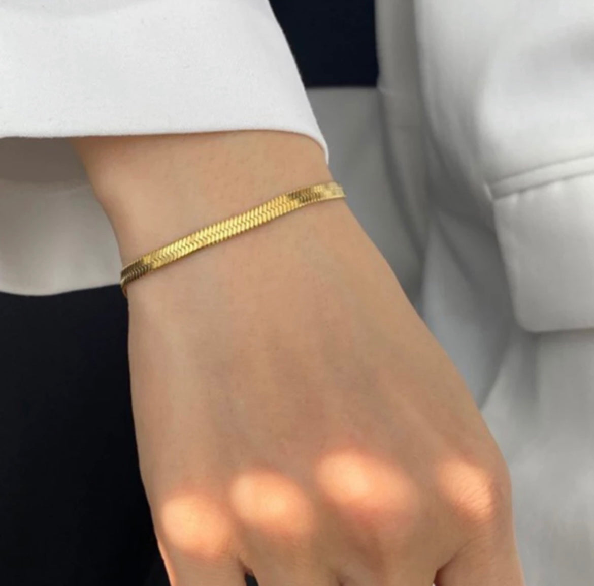Elevate your look at the beach or pool this summer with the dainty herringbone style bracelet. Perfect for stacking or wearing alone. 

This piece is made to last, hypoallergenic  & waterproof.

316L Stainless Steel 18K Gold Plated

6.5 inches long +2 inches ext/ 4 mm wide