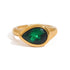 Expertly designed, the Ivy Ring features a stunning tear-shaped deep green gemstone that adds a modern statement to any ensemble. Crafted with precision and style, this accessory exudes elegance and sophistication, making it a must-have for any fashion-forward individual.&nbsp;

Green Zircon

Stainless Steel 18K Gold PVD Plated - Made to last!

Hypoallergenic, Tarnish free Beach &amp; Pool Friendly