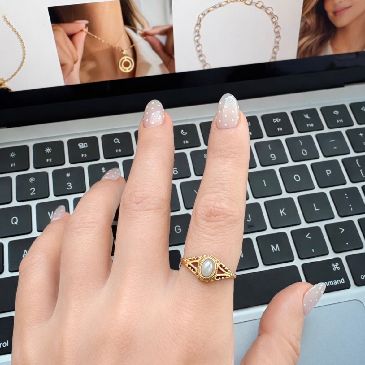 Margot vintage freshwater pearl gold ring worn on hand showing delicate oval pearl setting