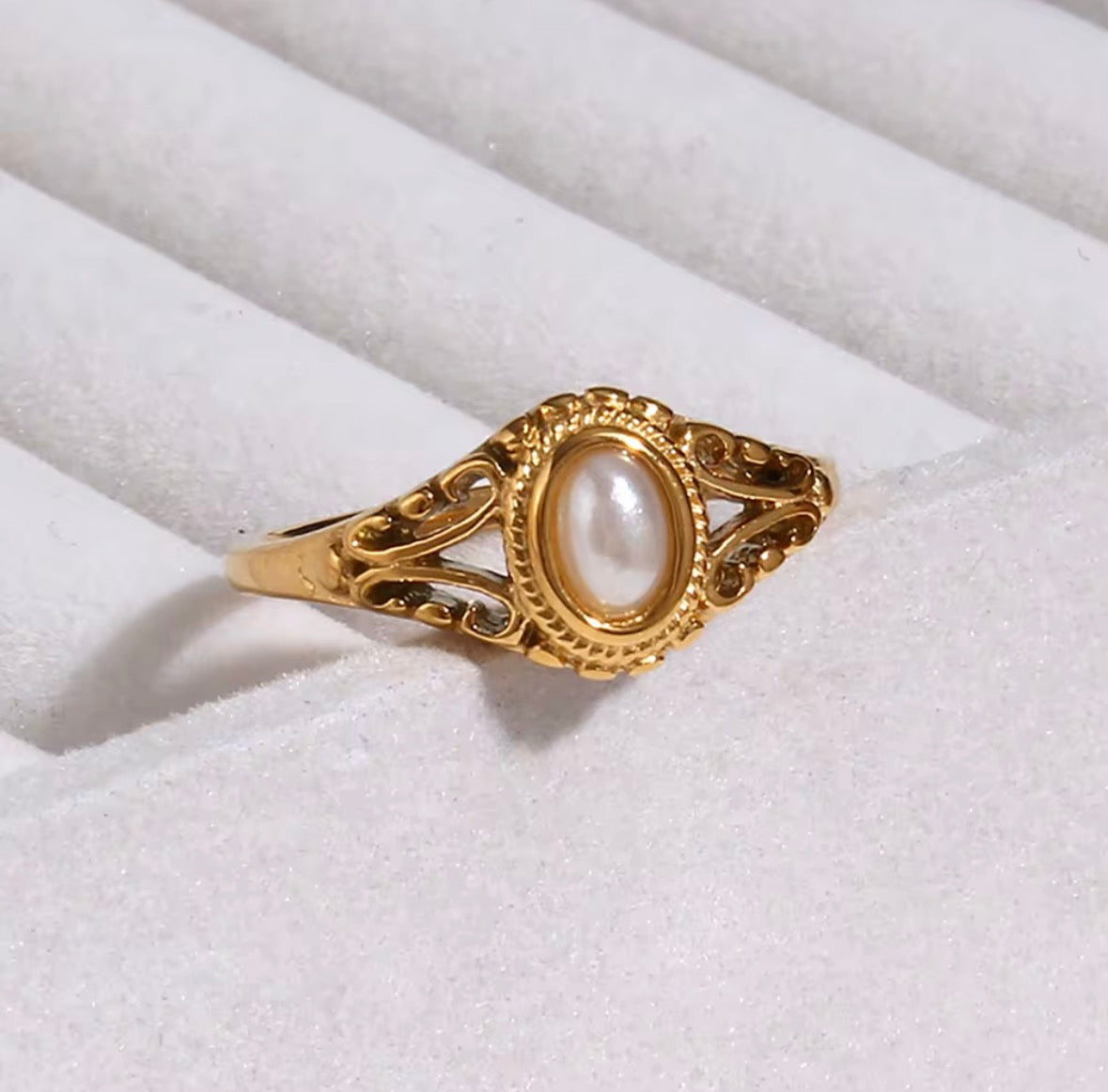 Side view of Margot vintage freshwater pearl ring showing intricate gold filigree band design