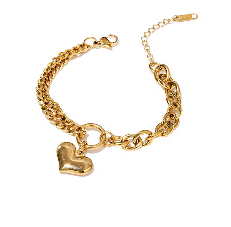 This Heart Charm Bracelet exudes elegance with a modern, chic design. The delicate cuban and oval link chains are connected by a heart charm, making it a symbol of love and fashion. Wear this stunning bracelet as a reminder of your style and passion.
316L Stainless Steel
6.5 inches long+ 2 " extension
Non Tarnish, Hypoallergenic and water resistant.