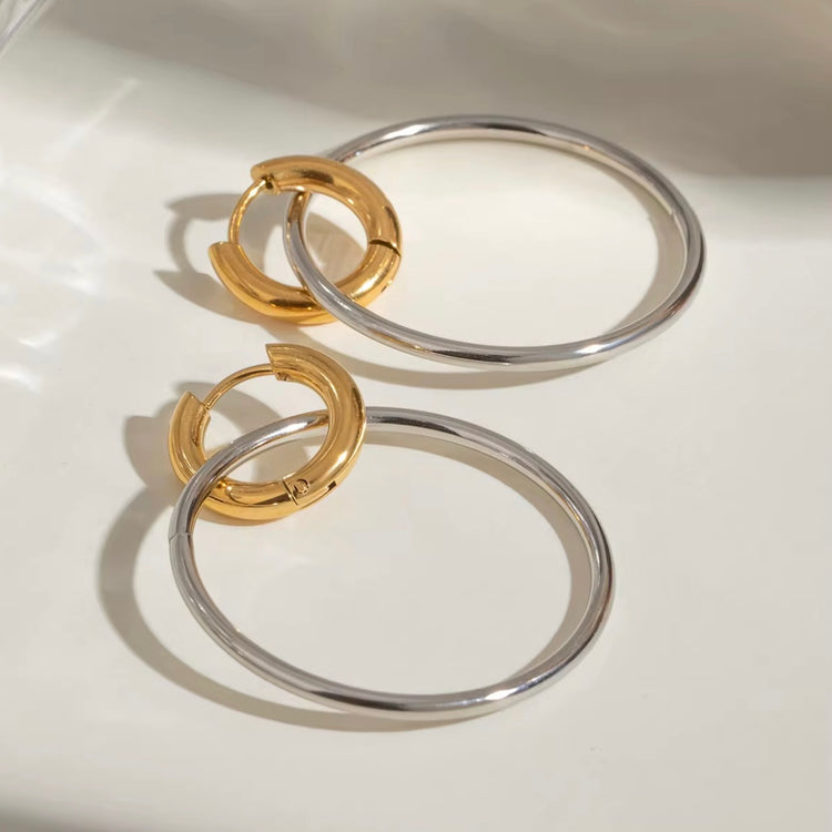 Chunky gold and silver hoop earrings made from waterproof, tarnish-free materials
