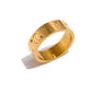 Hypoallergenic gold statement ring with cosmic design