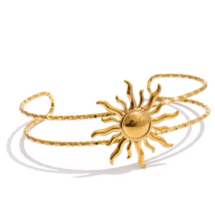 Add some ocean sunset vibes to your summer look with our Beach Bum Bangle Bracelet. Made to last, this must-have accessory will make you the it girl at the beach or pool. Don&