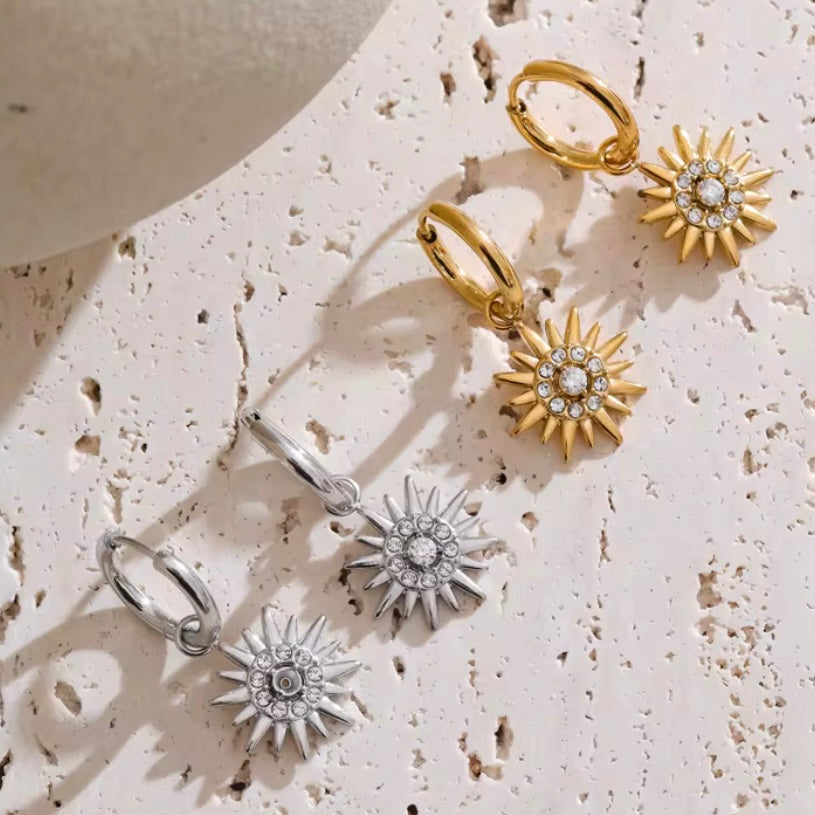 Experience endless summer vibes with Sun Huggies Earrings. These earrings keep the feeling of summer alive forever, making them the perfect accessory for any sun lover. Stay stylish and always feel the warmth of the sun with these trendy earrings.

Made to last! Non Tarnish and Water Resistant, Hypoallergenic




18K Gold Plated over 316L Stainless Steel base


