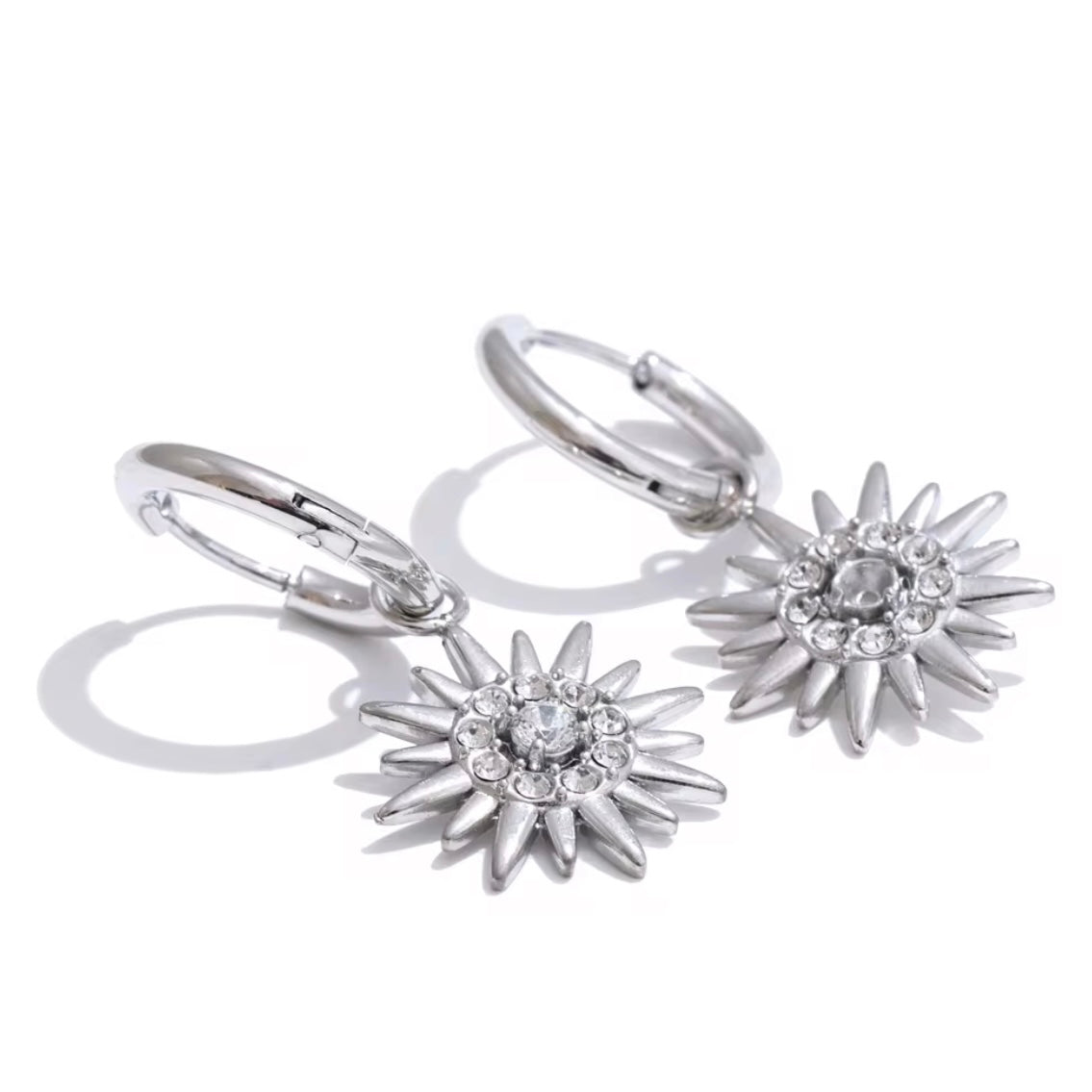 Experience endless summer vibes with Sun Huggies Earrings. These earrings keep the feeling of summer alive forever, making them the perfect accessory for any sun lover. Stay stylish and always feel the warmth of the sun with these trendy earrings.

Made to last! Non Tarnish and Water Resistant, Hypoallergenic




18K Gold Plated over 316L Stainless Steel base


