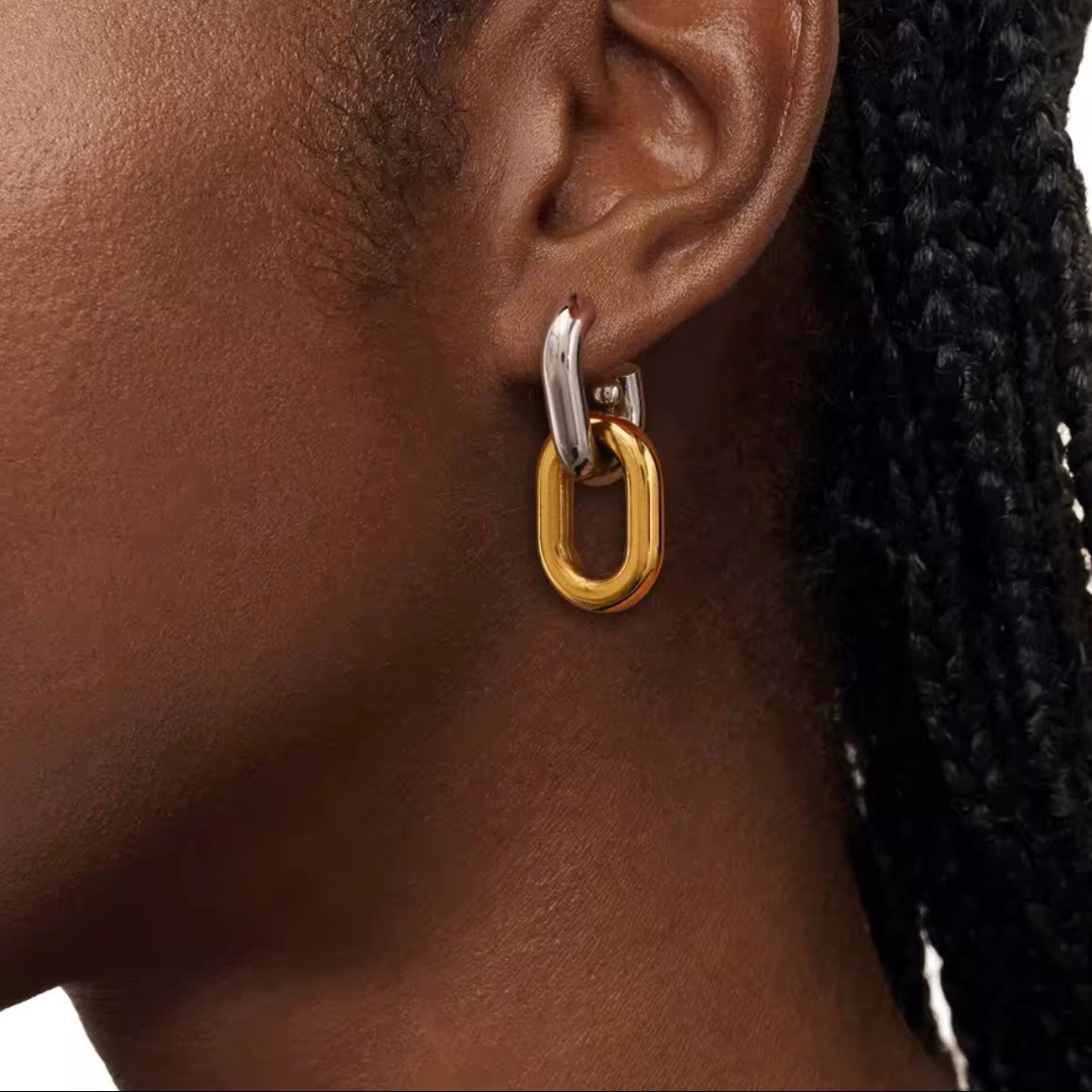 Introducing Erina Two Tone Chain Hoop Earrings - a must-have for any collection. These elegant earrings feature a trendy two-tone design and are sure to elevate any outfit. A staple for every fashion-forward individual.

Made to last!&nbsp;Tarnish and Water Resistant, Beach & Shower friendly, Hypoallergenic




18K Gold Plated over 316L Stainless Steel base