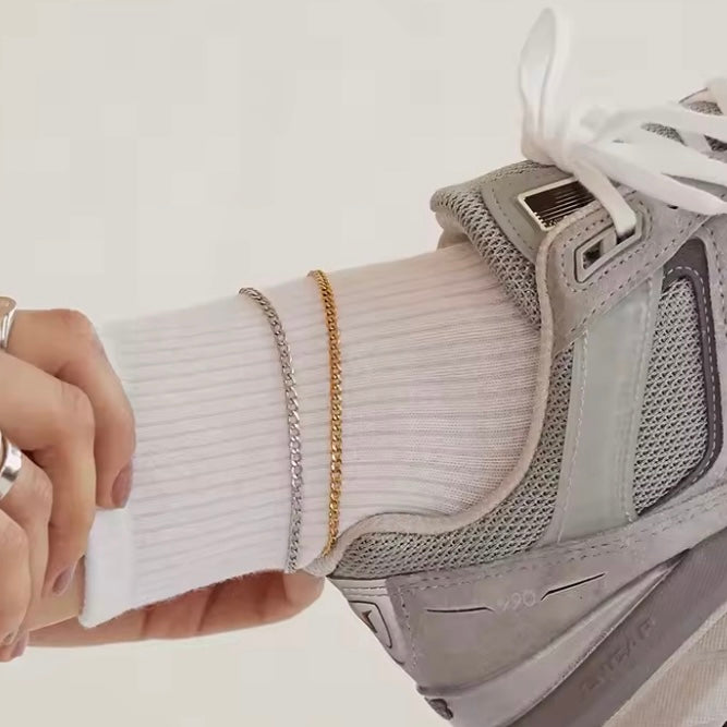 Thin Cuban Link Anklet ELSSIZ shown on a leg with a sneaker on