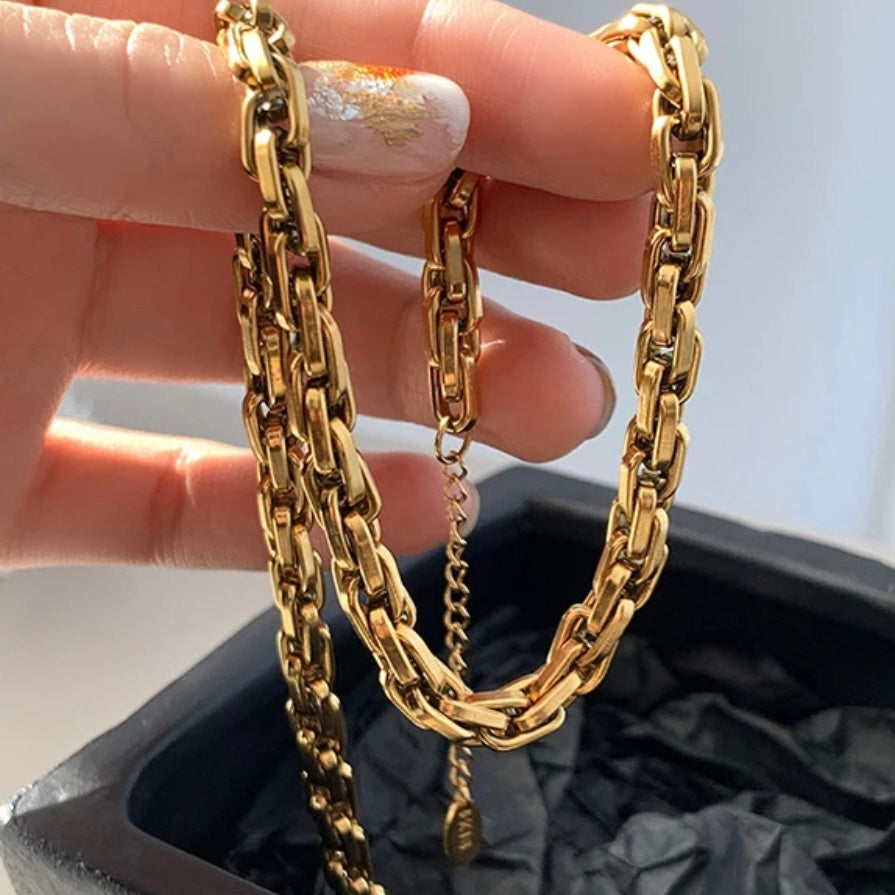 Introducing the Nora Luxury Woven Necklace, a one-of-a-kind piece that exudes strength and beauty. Made with high-quality materials, this necklace offers a luxe touch to any outfit. A must-have for those seeking a unique and sophisticated accessory.

Made to last!&nbsp;Tarnish and Water Resistant, Hypoallergenic

6mm wide

16 inches long + 2 Inches Ext

Closure :Lobster Clasp




18k Gold Plated over 316L Stainless Steel base