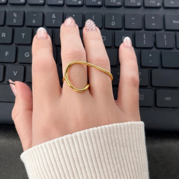 Billy Geometric Double Ring in gold worn on hand over keyboard – waterproof geometric statement ring