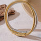Introducing the Ava Cord Bangle Bracelet - a sleek and modern accessory that effortlessly adds a chic touch to any outfit. Made with a flexible cord design, this bracelet is both stylish and comfortable to wear. Elevate your look with this versatile and sophisticated piece.

 

This piece is made to last, hypoallergenic  & waterproof.

316L Stainless Steel 18K Gold Plated

Max fit 7inches / Link 5mm wide
