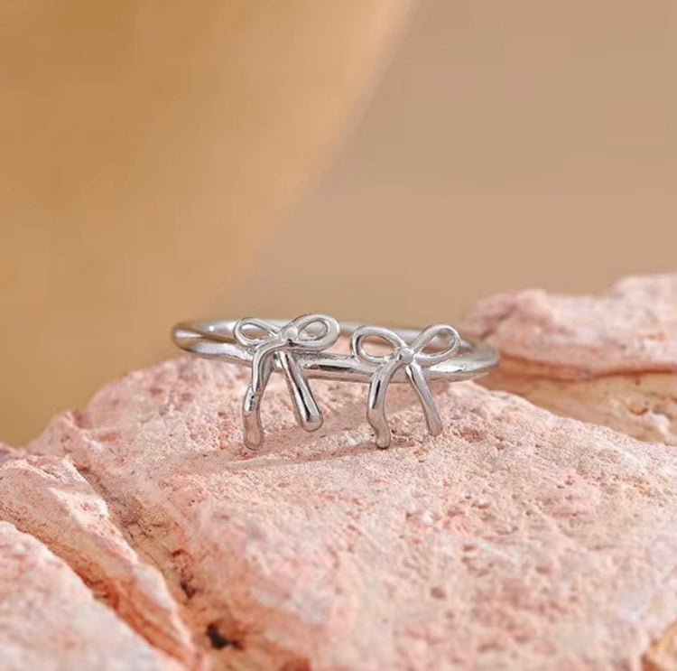 two bows ring Pinterest jewelry finds, feminine minimalist jewelry,