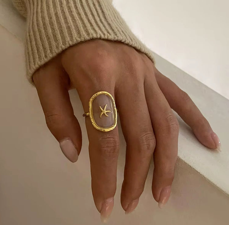 This See Through Starfish Ring is perfect for adding a touch of beach vibes to your summer wardrobe. Its unique design allows for a see through effect, making it a truly unique piece. Get ready to stand out with this one of a kind ring. Made for the summer sun and sand.
Fits SIZE - 7/ Open size
Stainless Steel 18K Gold PVD Plated - Made to last!
Hypoallergenic, Tarnish free 