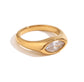 Close-up of Luma gold marquise cut clear stone ring on white background, non tarnish modern ring