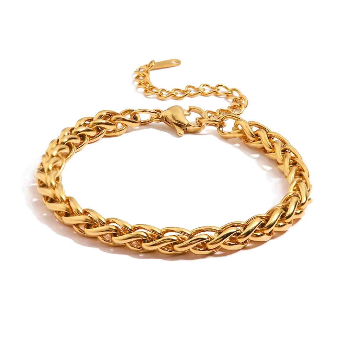 The Paola Bracelet boasts a timeless woven design and is crafted to resist tarnishing, ensuring its elegance and quality lasts for years to come. Exude sophistication and effortless style with this beautiful accessory.



316L Stainless Steel 18K PVD Gold Plated

6.5 inches long +2" inches ext