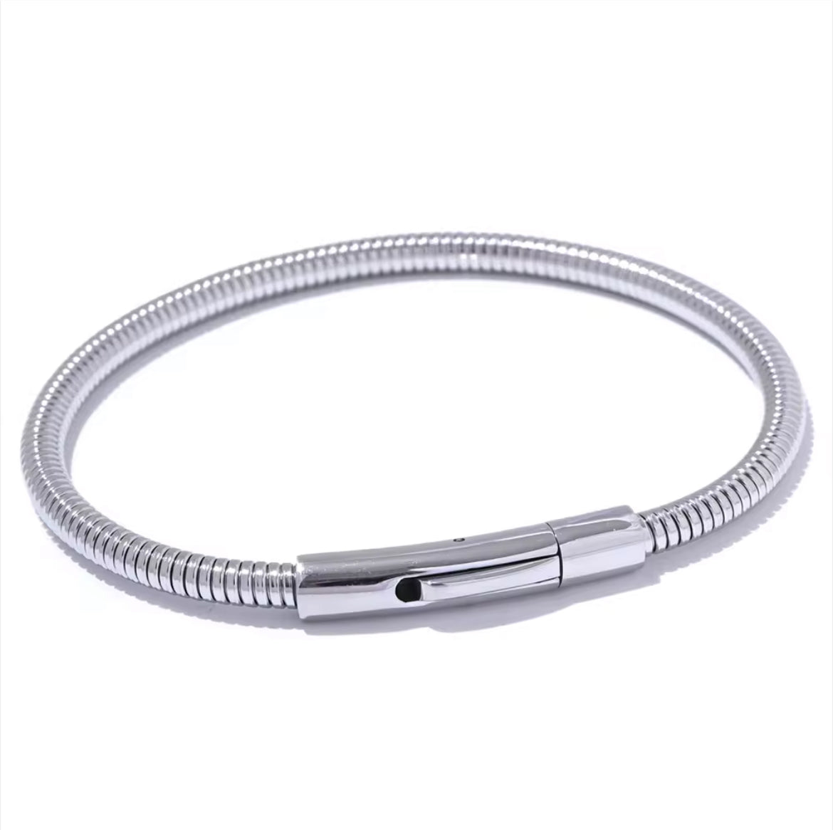 Introducing the Ava Cord Bangle Bracelet - a sleek and modern accessory that effortlessly adds a chic touch to any outfit. Made with a flexible cord design, this bracelet is both stylish and comfortable to wear. Elevate your look with this versatile and sophisticated piece.

 

This piece is made to last, hypoallergenic  & waterproof.

316L Stainless Steel 18K Gold Plated

Max fit 7inches / Link 5mm wide