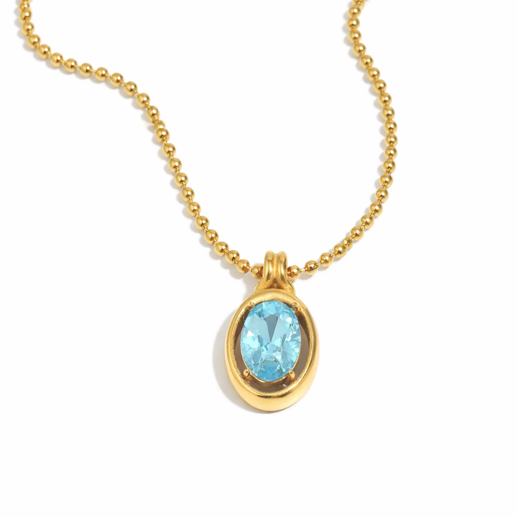 Skye light aqua gemstone pendant necklace in 18K gold plated stainless steel with beaded chain on white background