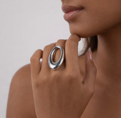 Close-up of gold Sloane Oval Ring featuring smooth oval design by ELSSIZ