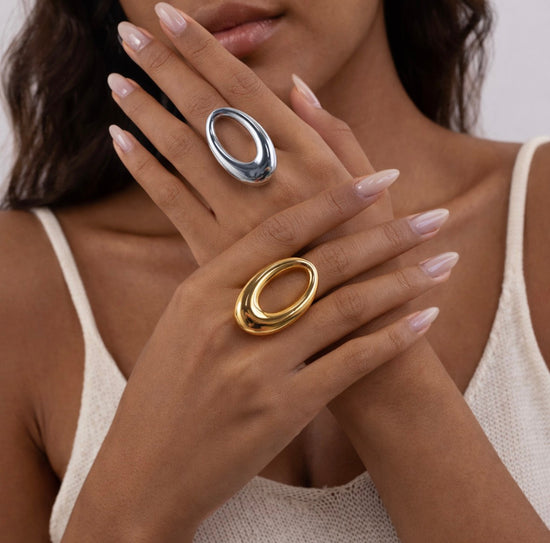 Silver Sloane Oval Ring on model hand, polished stainless steel statement ring by ELSSIZ