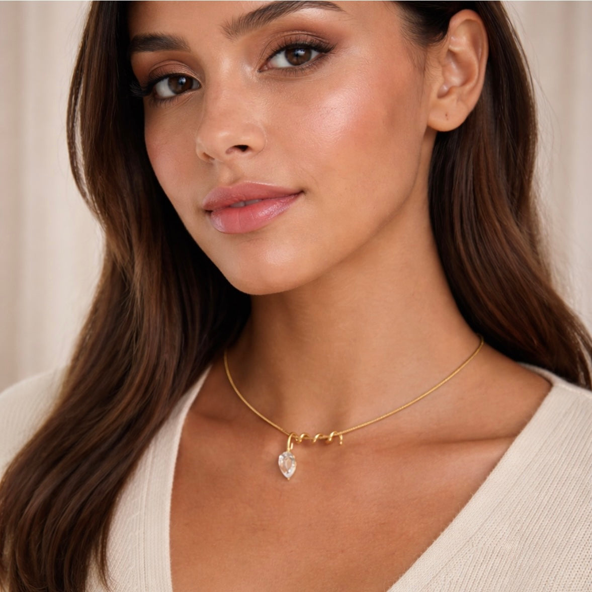 Model wearing Vitelle gold drop necklace minimalist waterproof jewelry