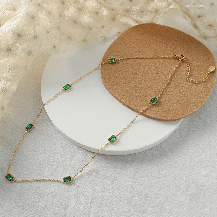 Delicate waterproof gold necklace with green accents