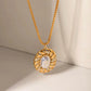 Vintage-inspired ribbon necklace with large faux pearl on gold chain – statement pearl pendant jewelry